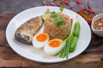 Thai food, Fried brown rice with Thai Mackerel chili Paste with. Served with Mackerel, Boiled eggs, Cucumber, and Lime, healthy food