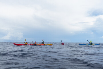 Naklejka premium sea coast travel by sea kayaks