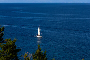 sailing in blue mediterranean sea