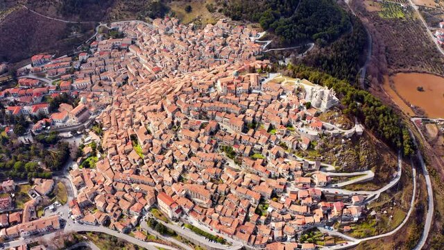 4k drone flight above footage (Ultra High Definition). Colorful spring cityscape of Morano Calabro town. Picturesque morning scene of Italy, Europe. Beautiful world of mediterranean countries.