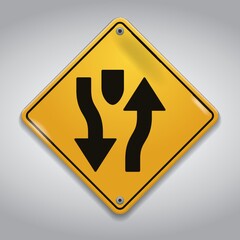 divided highway ahead road sign