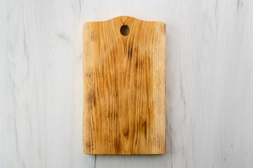 Overhead view of wooden cutting board