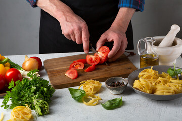 Cooking italian pasta and tomato sauce