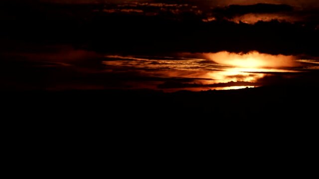 Time lapse of sunset over sea. Nature, coastal landscape. Capi Corb, Mediterranean coast of Spain