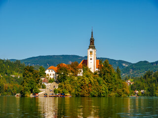 Fototapeta na wymiar View on the Pilgrimage Church of the Assumption of Maria on the Lake Bled.