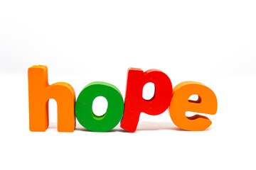 Word Hope with 3d wooden letters isolated on white