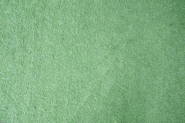 Green doormat made of artificial grass