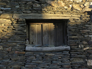 Window on an old stone wall