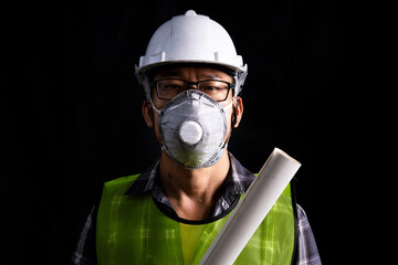 Portrait engineer wearing safty unifrom to inspection,checking construction ,holding radio...