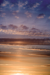 Sunset showing a full frame of sky and clouds
