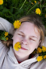  teenage girl with yellow dandelions