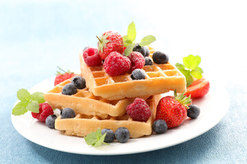 waffles with fresh fruits in plate