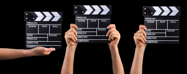 Set of film clapper boards and human hands isolated on black background