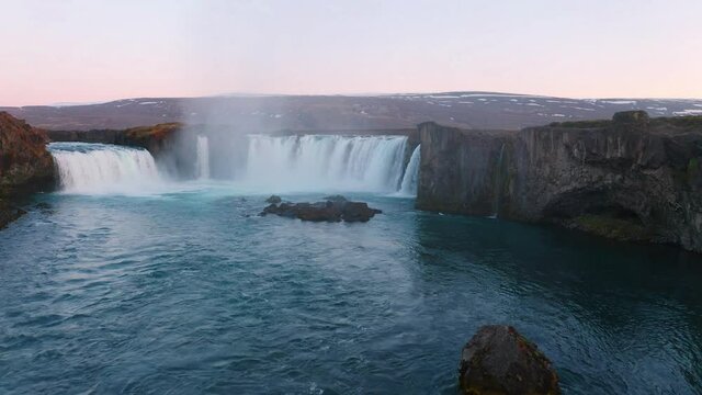 4k drone forward video (Ultra High Definition). Picturesque summer scene of Godafoss waterfall. Amazing morning view of Skjalfandafljot river, Iceland, Europe. Beauty of nature concept background.