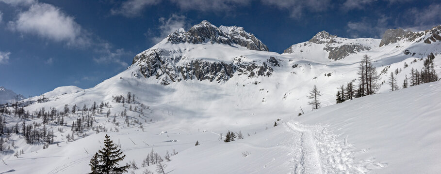 Panoramic winter view of the Poncione di Cassina Baggio from the Piansecco hut in the Bedretto valley in Switzerland.