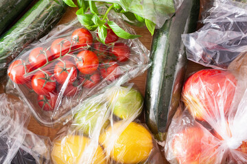 single use plastic waste issue. fruits and vegetables in plastic bags