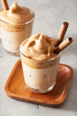 dalgona coffee in glass. trendy Instant coffee whipped with sugar and hot water