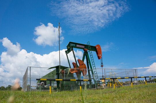 On shore oil pump (nodding donkey) in Seria, Brunei. Most of the oil in Brunei were explored & processed via a joint-venture company Brunei Shell & Brunei government.