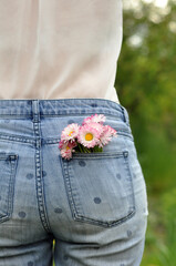 Daisies as an element of decoration of clothes and shoes