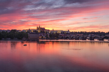 Purple view on Prague Castle with Charles Bridge after the sunset