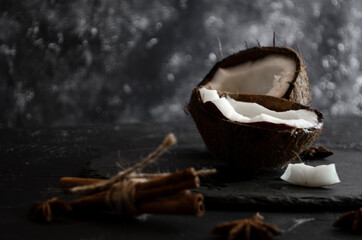 coconut wedges on black background
