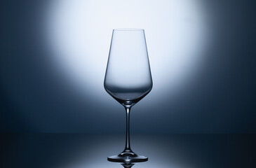 Empty wine glasses on a blue clean gradient background.