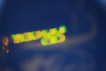 Defocused light background. Blurred bright light. 
technological bokeh.