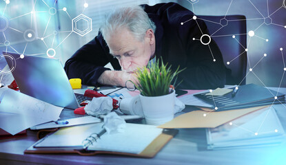 Overworked businessman sitting at a messy desk; light effect