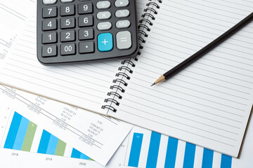 Notebook, Pencil And Calculator On Financial Report - Business Accounting Concept