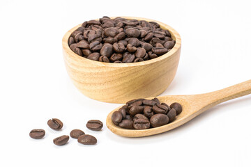 coffee beans in a wooden scoop and bowl isolated on white background.