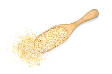 spoon with sesame seeds on white.