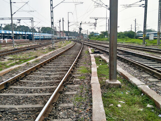 Close Up of Indian Railway Tracks low angel view from a rails sleepers near railway station...