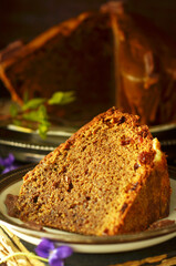 Piece of coffee cake on a rustic plate