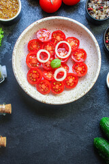 tomato salad vegetables Menu concept serving size. food background top view copy space for text organic healthy eating keto or paleo diet