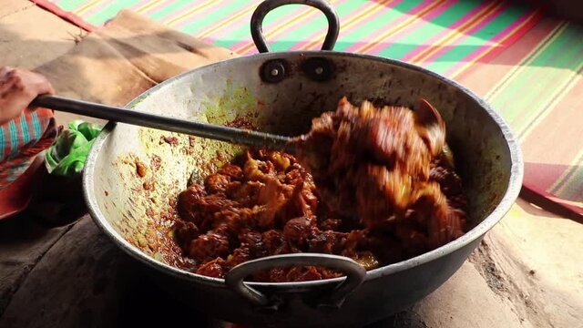 Close up of cooking Bangladesh Beef Kala Bhuna in hot wok