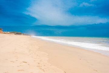 Fototapeta premium Artistic beautiful surreal colors blurred beach abstract background with water wave.