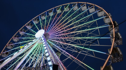 Ukraine, Kiev - January 15, 2019. Illuminated Ferris Wheel on Kontraktova Square in Kiev in the evening.