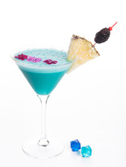 blue hawaiian cocktail with pineapple slice. High quality photo