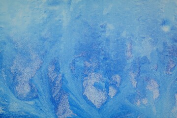 Frost pattern on the glass. Frost on the window. Winter photo. Cryesthesia. Freezing. Macro