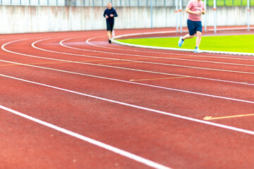 Fototapeta premium legs of a long distance runner.Men runs.Outdoor image