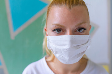 Young woman with face mask protection of Coronavirus.	