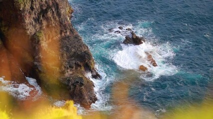 Aerial view of rocks in Atlantic ocean, Kallur Lighthouse location, Kalsoy island. Wonderful summer scene of Faroe Islands, Denmark, Europe. Full HD video (High Definition).