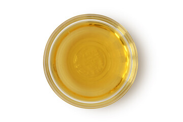 Apple cider vinegar in glass bowl on white background
