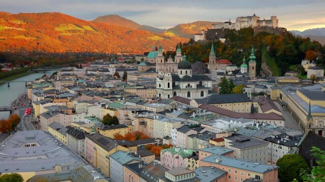 Spectacular cityscape of Salzburg, Old City, birthplace of famed composer Mozart. Colorful autumn scene of  Eastern Alps. Nice morning landscape with Salzach river. Full HD video (High Definition).
