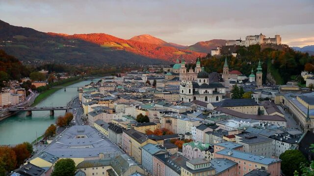 Time lapse clip. Beautiful sunset on Salzburg, Old City, birthplace of famed composer Mozart. Colorful autumn scene of Salzach river, Eastern Alps. Full HD video (High Definition).
