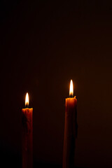 candles that are lit in the dark