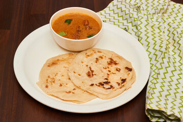 Parotta + chicken Curry