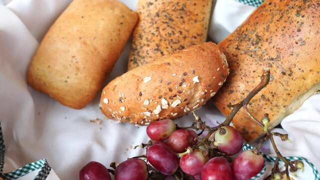 Artisanal bakery: Fresh mixed Bun, grapes, rolls and ingredients