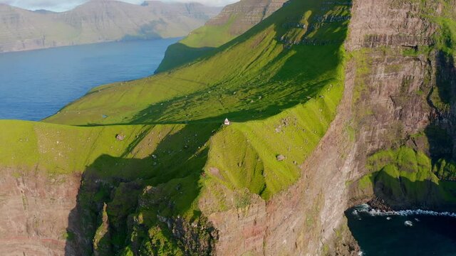4k point of view video (Ultra High Definition). Spectacular morning view of Kallur Lighthouse, Kalsoy island. Splendid summer scene ofFaroe Islands, Denmark. Fantastic seascape of Atlantic ocean.