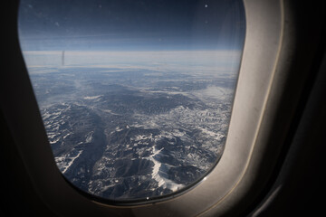 Snowcapped mountains photographed from a plane